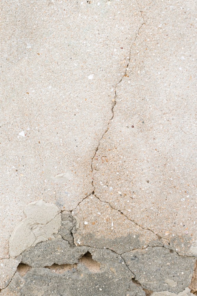 Crack in concrete wall to represent stress