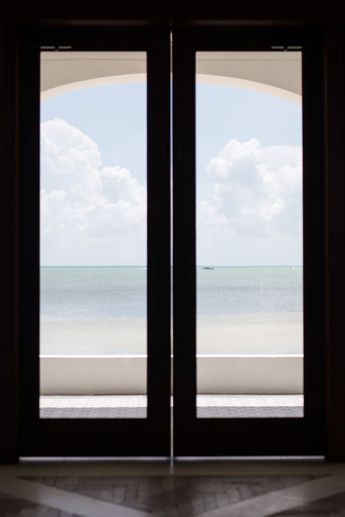 two doors ready to be opened to a beautiful ocean representing anxiety