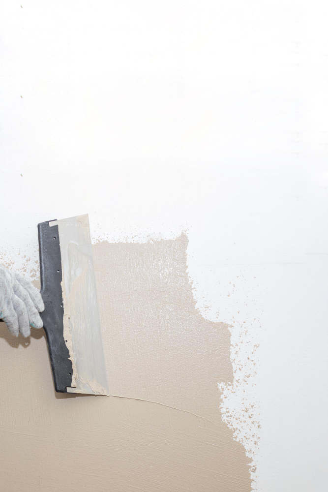 plastering wall to repair any issues to represent stress management therapy